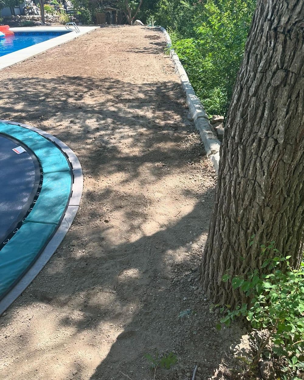 Gallery photos for Post-Pool Landscape Install with Sod, Curbing, and Lava Rock in Lehi: Image #9