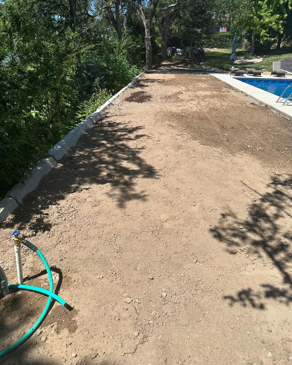 Gallery photos for Post-Pool Landscape Install with Sod, Curbing, and Lava Rock in Lehi: Image #7
