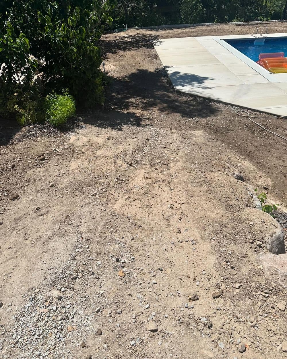 Gallery photos for Post-Pool Landscape Install with Sod, Curbing, and Lava Rock in Lehi: Image #6